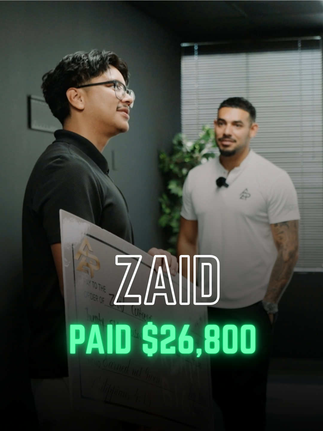 Apex Division rep with a big check