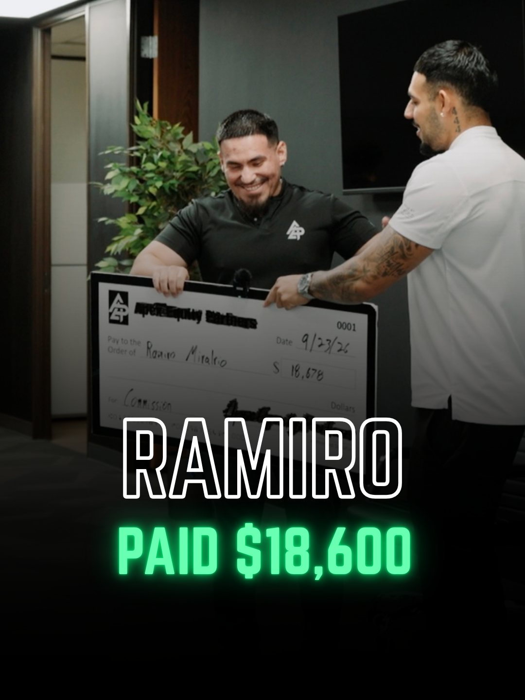 Apex Division rep with a big check