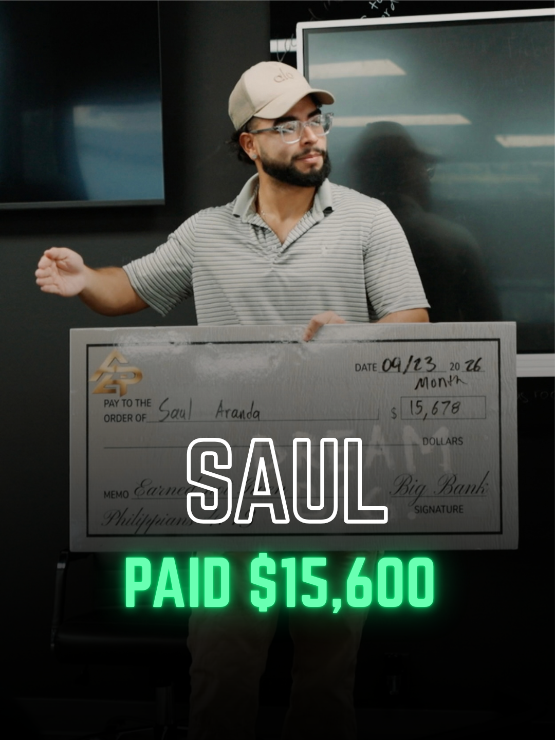 Apex Division rep with a big check