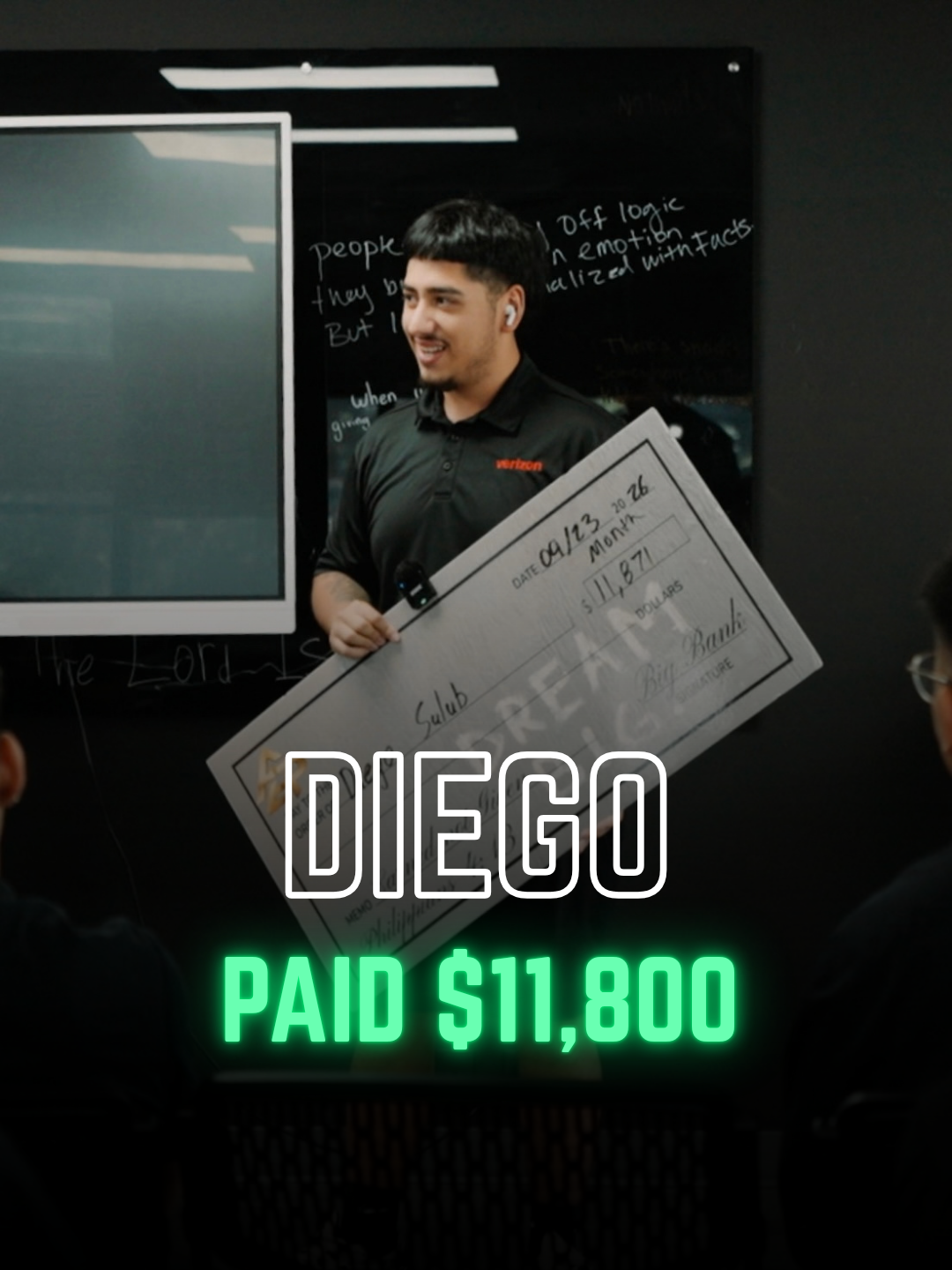 Apex Division rep with a big check